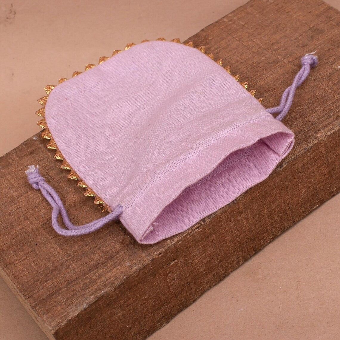 100 Soft Rose Pink Designer Pouch: Handcrafted with Sweet Round Gold Lace