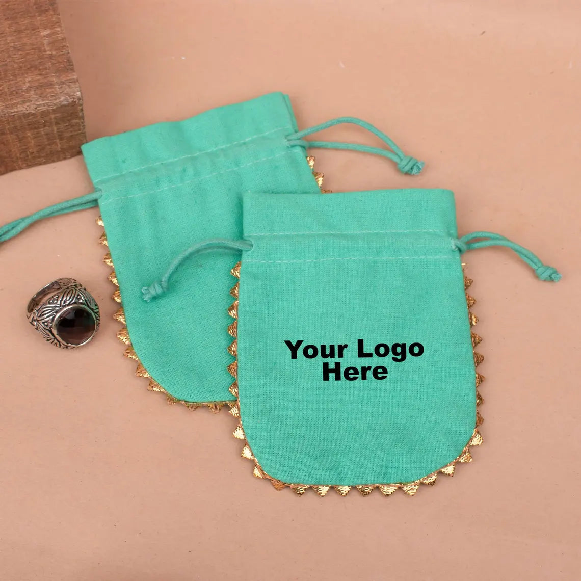 100 Vibrant Teal Designer Pouch: Handcrafted with Playful Round Gold Lace