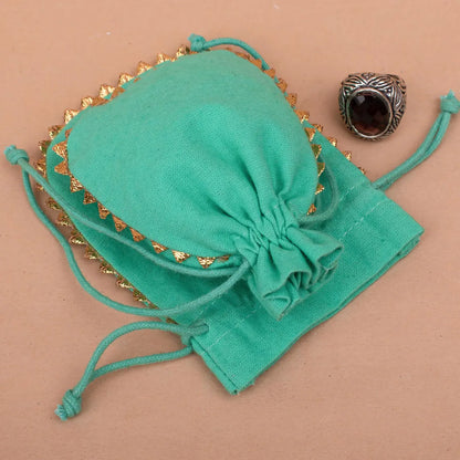 100 Vibrant Teal Designer Pouch: Handcrafted with Playful Round Gold Lace