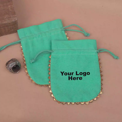 100 Vibrant Teal Designer Pouch: Handcrafted with Playful Round Gold Lace